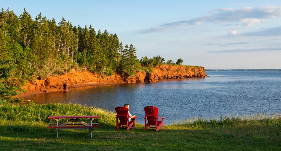 Port la Joye, wooden chairs, ocean view, forest