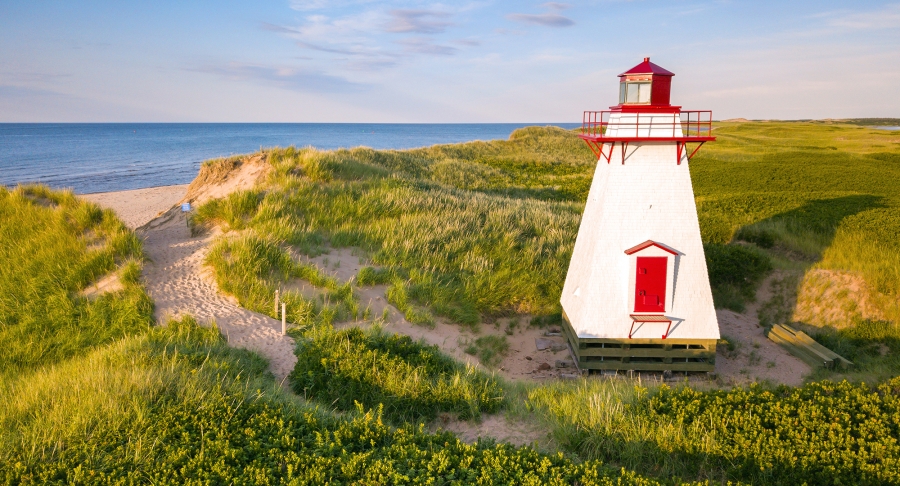 St Peters Harbour, Lighthouse, hills, beach